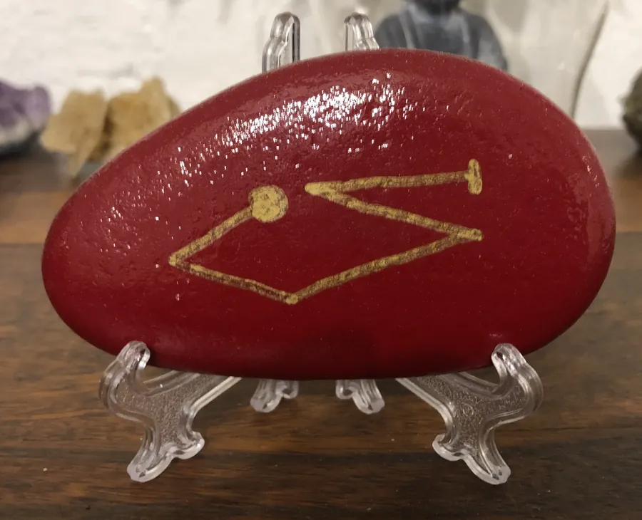 Galet du rayon rubis doré